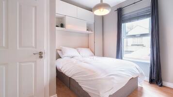 1 dormitorio, tabla de planchar con plancha, Internet y ropa de cama