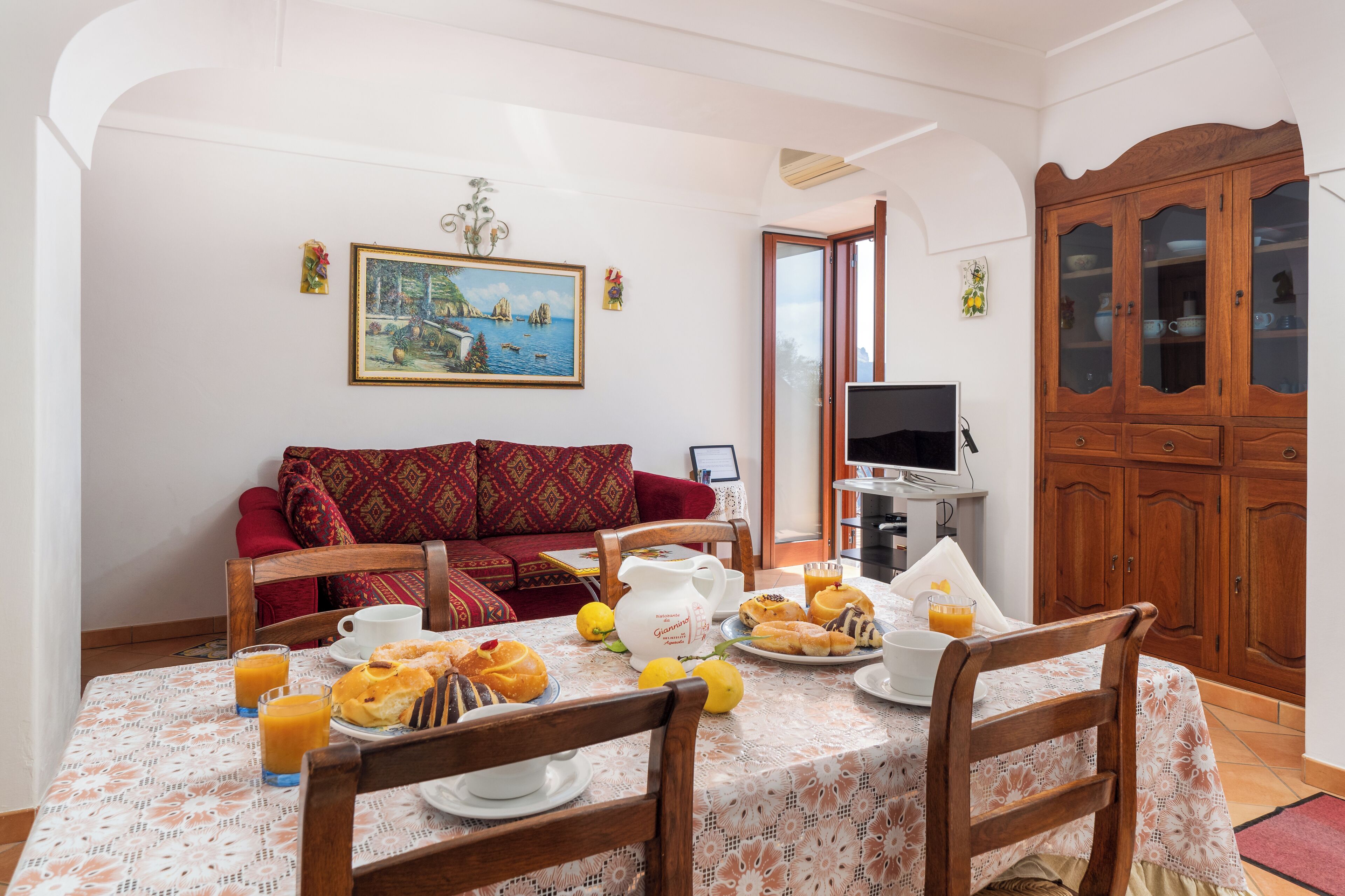 Panoramic Villa, Sea View | Living area | 40-inch flat-screen TV with digital channels