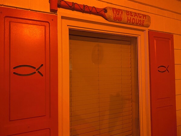 A closed door with a sign above it that reads "Beach House." - A Little Piece Of Heaven-5BR-2nd Row-Pet Friendly (North Myrtle Beach)