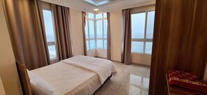 Chambre Triple, vue mer