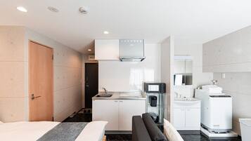 Fridge, microwave, electric kettle, cookware/dishes/utensils