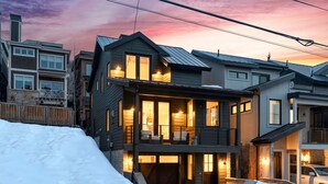 A two-story house with a balcony, a garage, and a driveway. - Old Town Alpine Vista: Near Park City Ski Resort (Park City)