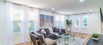 Designer Sun Filled Condo - Walk to Town