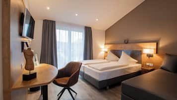 Luxe beddengoed, een bureau, een laptopwerkplek, gratis wifi