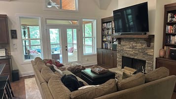 Smart TV, fireplace, DVD player, books