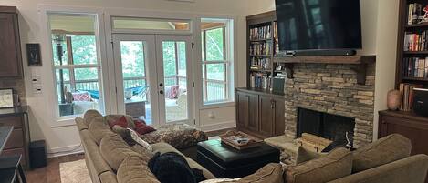 Smart TV, fireplace, DVD player, books