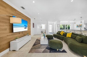 Exclusive House, Patio | Living area | 50-inch plasma TV with cable channels