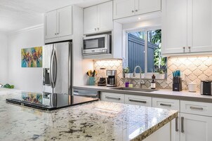 Exclusive House, Patio | Private kitchen | Coffee/tea maker, dining tables