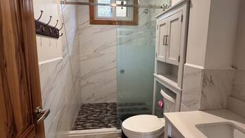 Shower, towels, soap, shampoo