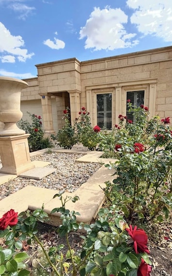 House exterior boasting the natural limestone facade
