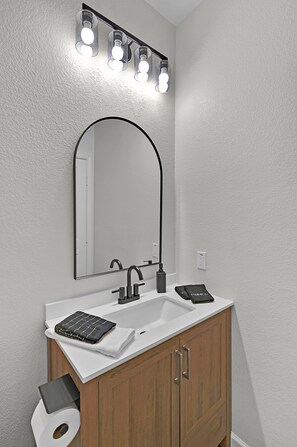 Hair dryer, towels, soap, shampoo