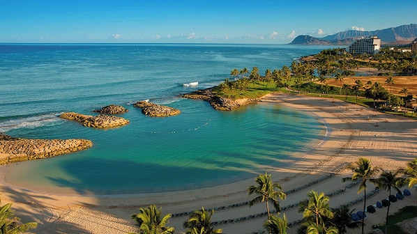 On the beach, sun-loungers, beach towels