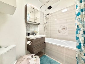 Hair dryer, towels, soap, shampoo