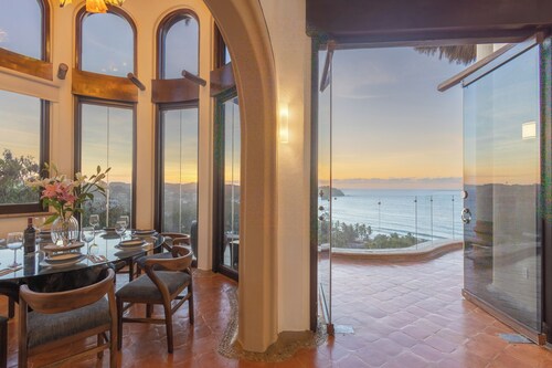 Escape to Casa Ensueño, a stunning three-story luxury villa with ocean views.