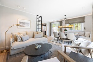 TV, fireplace - Gardenlodge 3 - New building. Family. Bath style. (List auf Sylt)