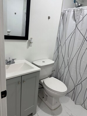 Bidet, soap, toilet paper