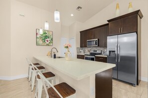 Fridge, microwave, oven, stovetop - Waterfront+Pool+HotTub+Plunge! Welcome to our waterfront Oasis in Cape Coral FL! (Cape Coral)