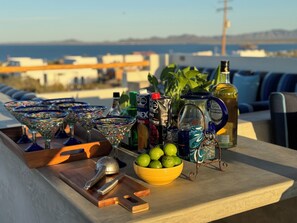 Outdoor dining - Sunset Villas - Casita Nopal | Rooftop Haven with Fire Table (El Sargento)