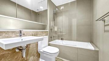 Hair dryer, towels, soap, toilet paper