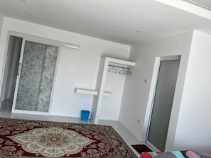 Double Room, Balcony, City View | Desk, laptop workspace, blackout curtains, iron/ironing board - Alisara Apartments (Bangkok)