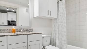 Hair dryer, towels, soap, toilet paper