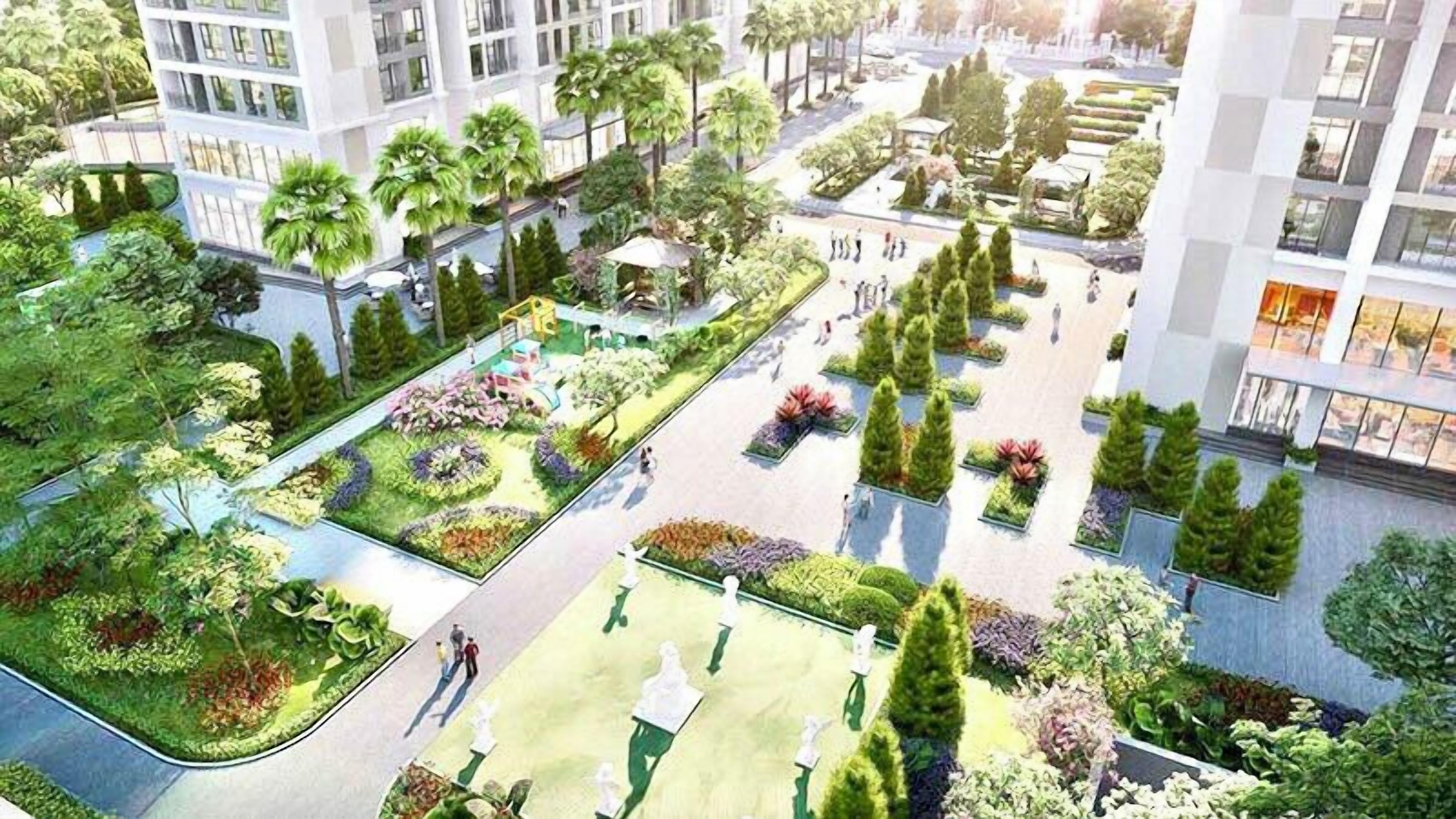 Un desarrollo urbano moderno con edificios de gran altura, jardines ajardinados y senderos peatonales.