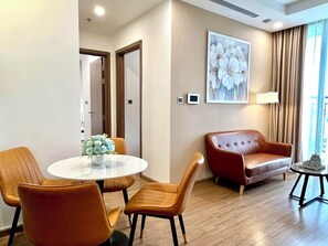 Apartment, 2 Bedrooms | Desk, iron/ironing board, free WiFi, bed sheets - HMH - Vinhomes GreenBay Apartment (Hanoi)