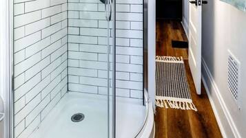 Shower, eco-friendly toiletries, hair dryer, towels