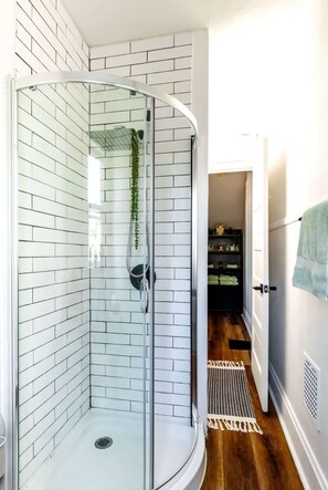 Shower, eco-friendly toiletries, hair dryer, towels