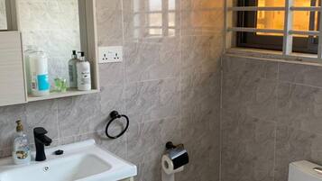 Villa | Bathroom | Shower, hair dryer, towels