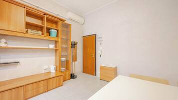 Comfort Condo | Living area | 25-inch flat-screen TV with satellite channels