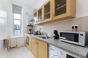 Apartment | Private kitchen | Fridge, microwave, oven, stovetop