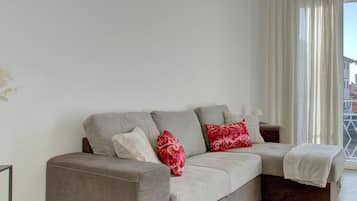 Apartment, City View | Living area | 42-inch LCD TV with cable channels