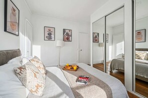 1 bedroom, desk, iron/ironing board, travel cot