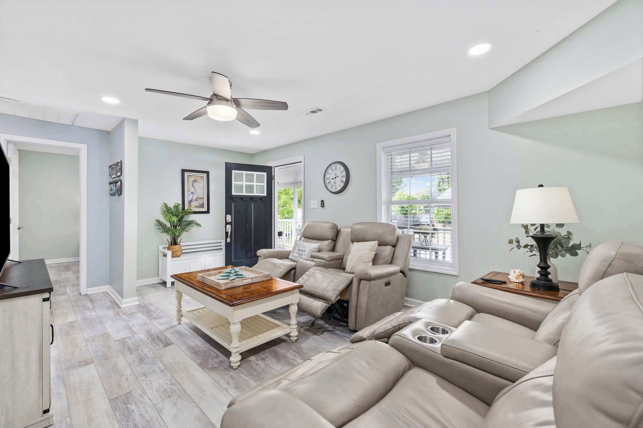 Living room with luxurious leather recliners.