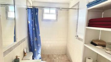 Shower, towels, soap, shampoo