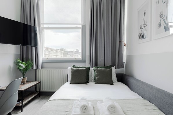 1 chambre, fer et planche à repasser, Wi-Fi, draps fournis