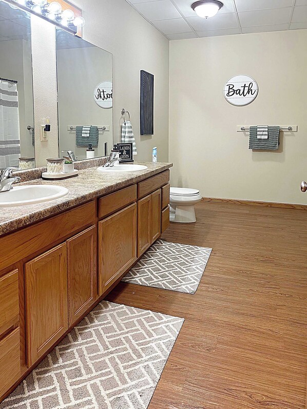 2 full baths with shower tubs. 
