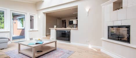 Smart TV, fireplace, books