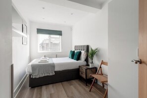 2 chambres, fer et planche à repasser, Wi-Fi, draps fournis