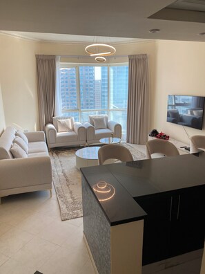 Living area - Cozy 1-bedroom apartment in lovely Sharjah with WiFi, AC, fitness room (sharjah)