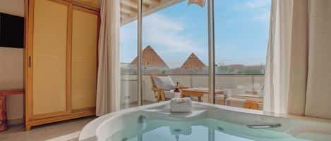 Romantic Suite, Balcony, Mountain View | Minibar, individually decorated, individually furnished, desk