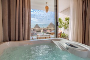 Honeymoon Suite, Balcony, Mountain View | Minibar, individually decorated, individually furnished, desk