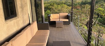 Modern 2-bedroom house with WiFi, AC in Tranquil Torio