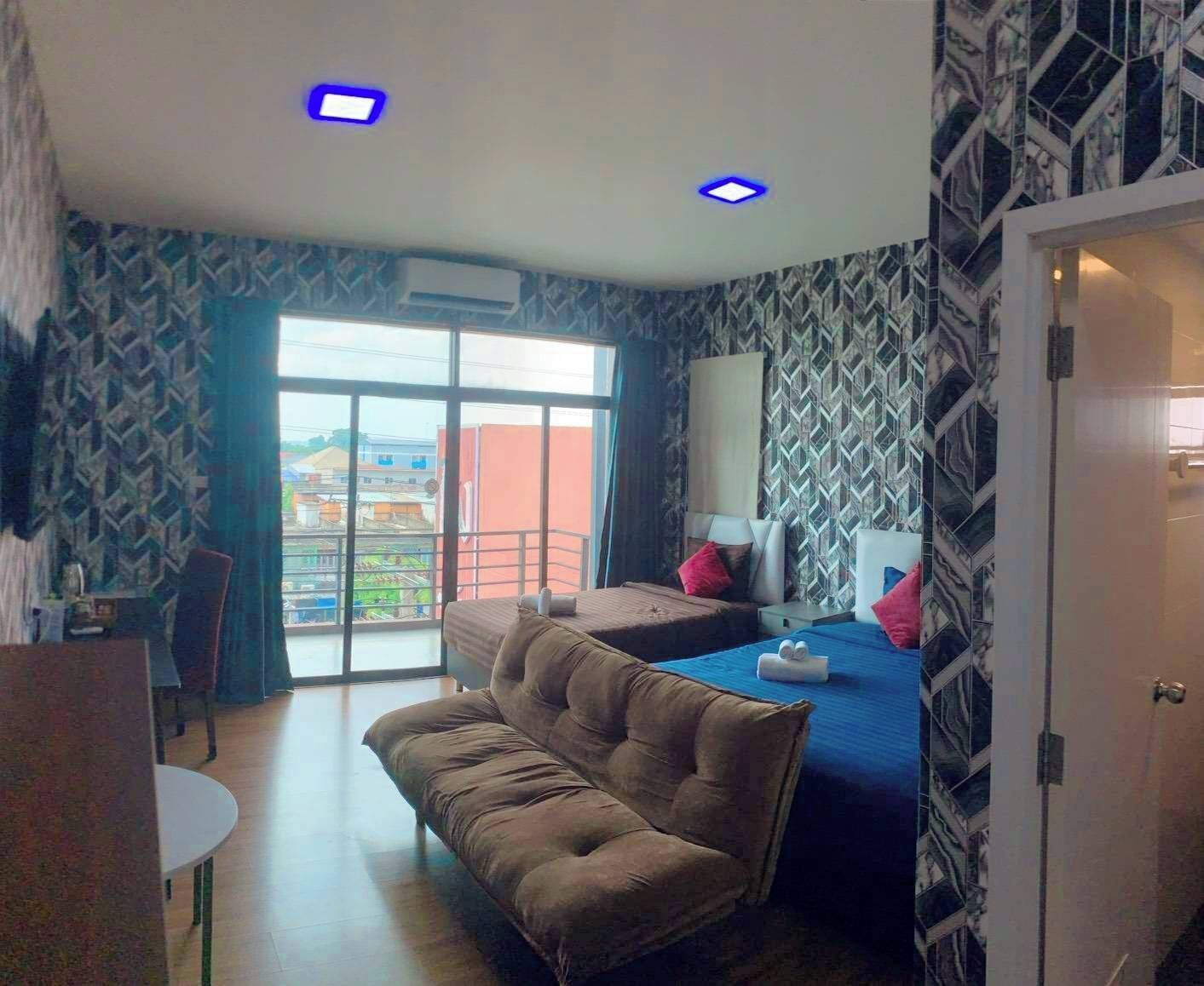 Quarto triplo, vista para a cidade | Wi-Fi de cortesia, roupa de cama