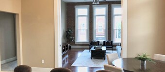 Bright and Spacious Historic Brick Loft off the square in Paola