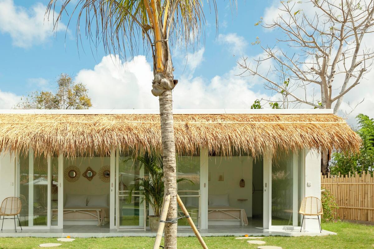 Deluxe Quadruple Room, Pool View | Premium bedding, down duvets, in-room safe, blackout curtains