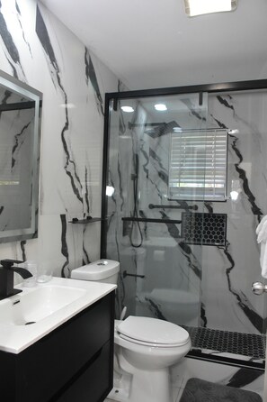 Hair dryer, towels, soap, toilet paper