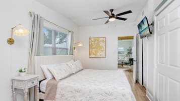 3 habitaciones, tabla de planchar con plancha y cuna de viaje