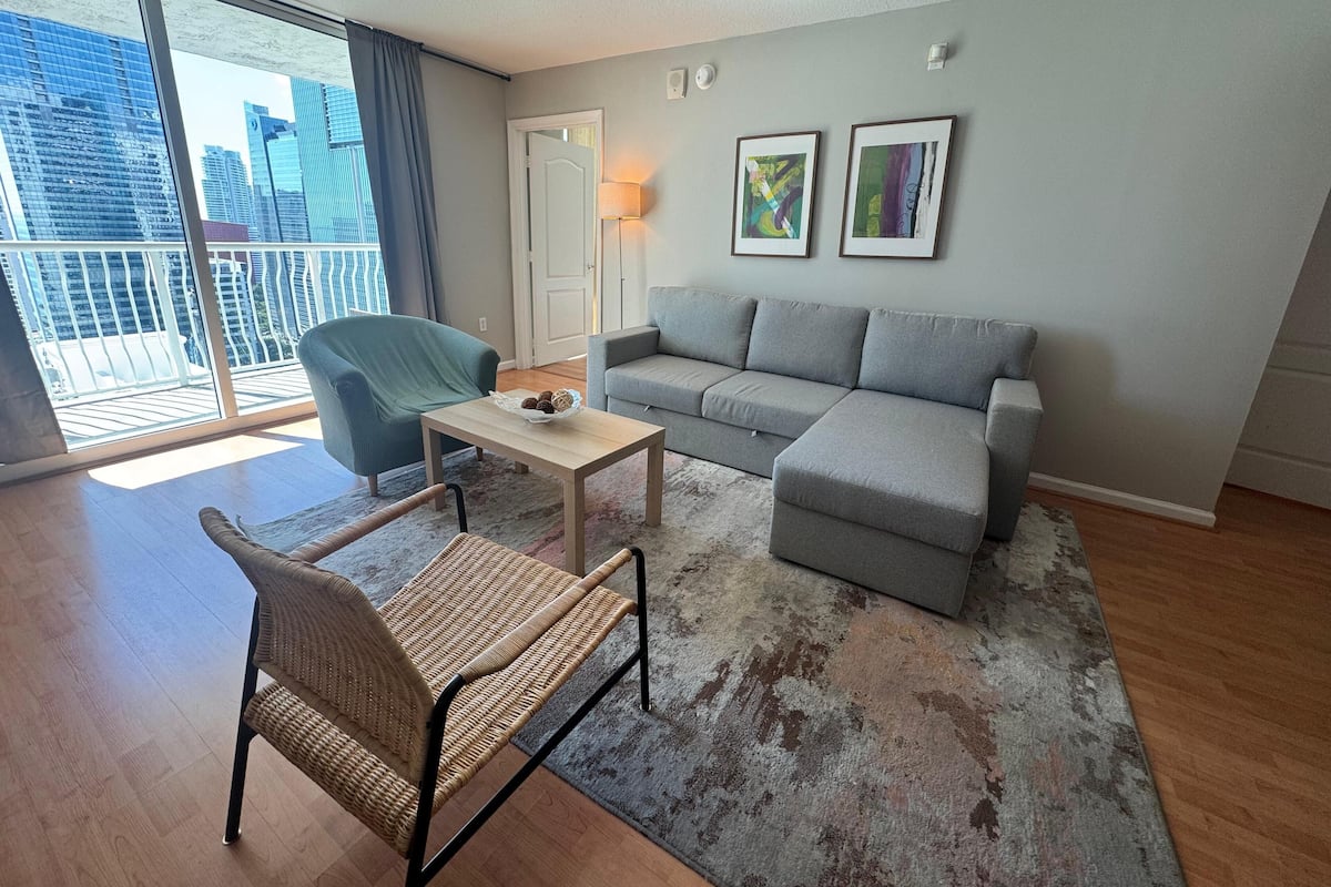 Condo, 2 Bedrooms, City View | Living area | 50-inch flat-screen TV with digital channels